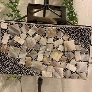 MadBag Mother of Pearl box clutch with beading detail throughout.